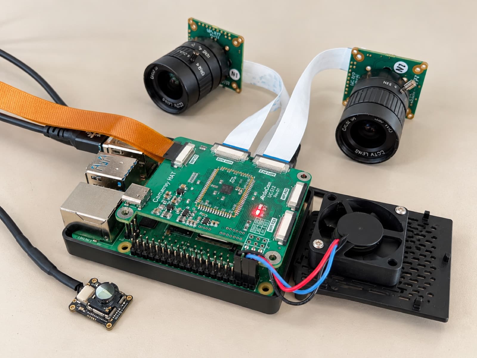 The EASY prototype: a Raspberry Pi 4 with a camera HAT, two RGB cameras, a thermal sensor and a cooling fan