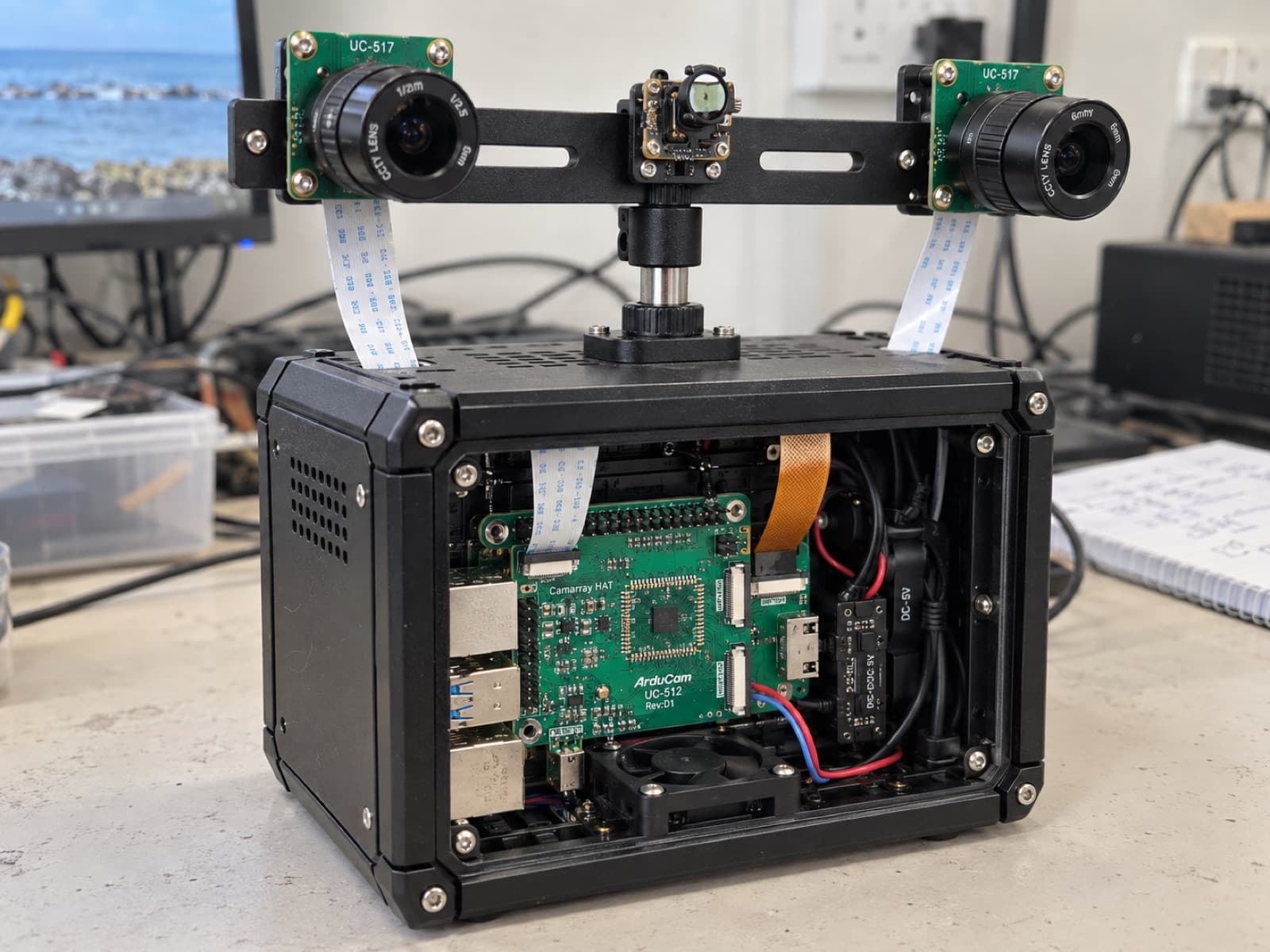 The integrated node design study: cameras and thermal sensor on a rigid bar above an enclosed Raspberry Pi